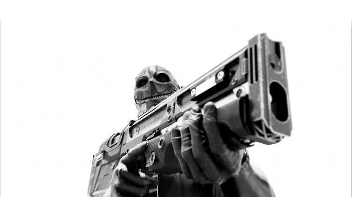 Stylised black and white promotional art for Den of Wolves showing a character in a leering leather mask brandishing a gun so close to the camera his head can barely be seen peeking over the top of the weapon.