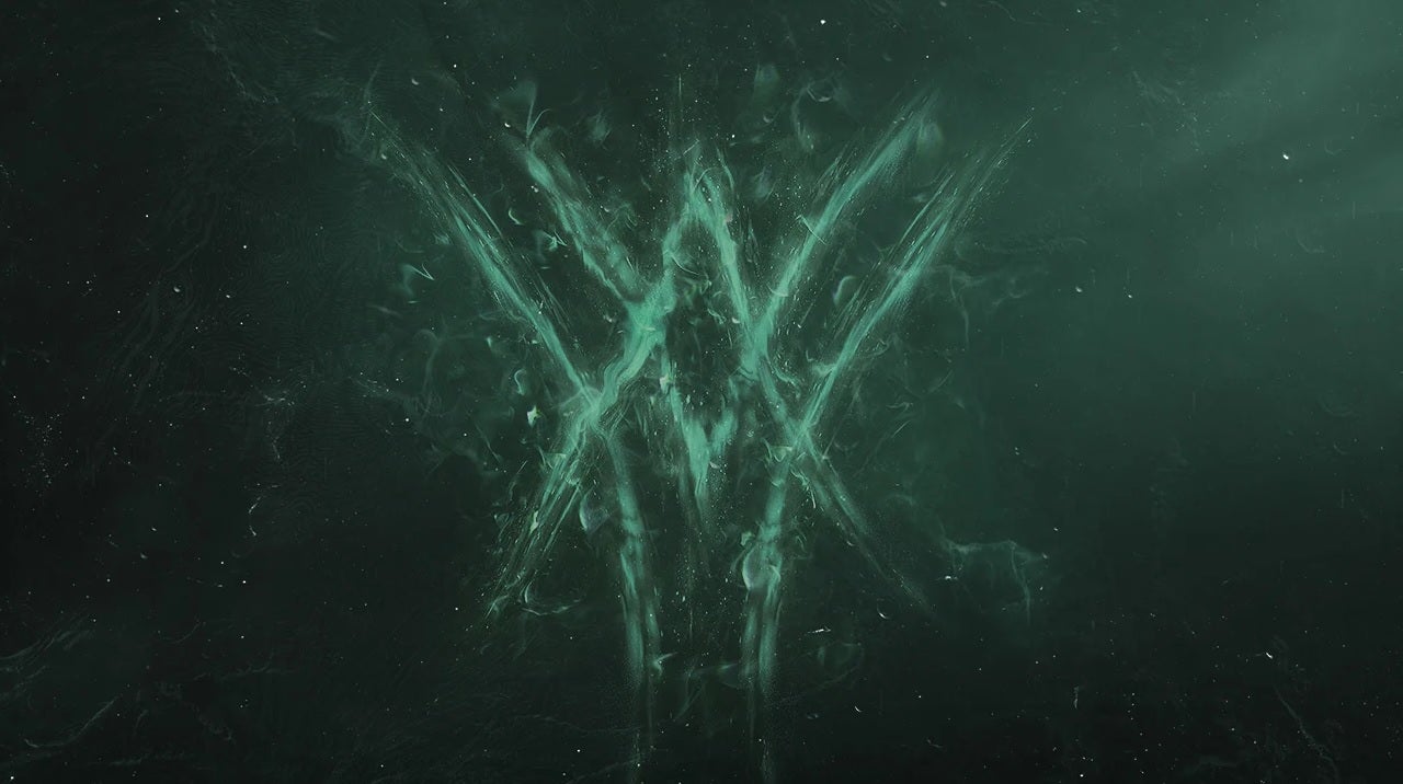 Destiny 2 - A teaser image for The Witch Queen expansion reveal. A flaming green logo made up of intersecting carats pointing up and down.