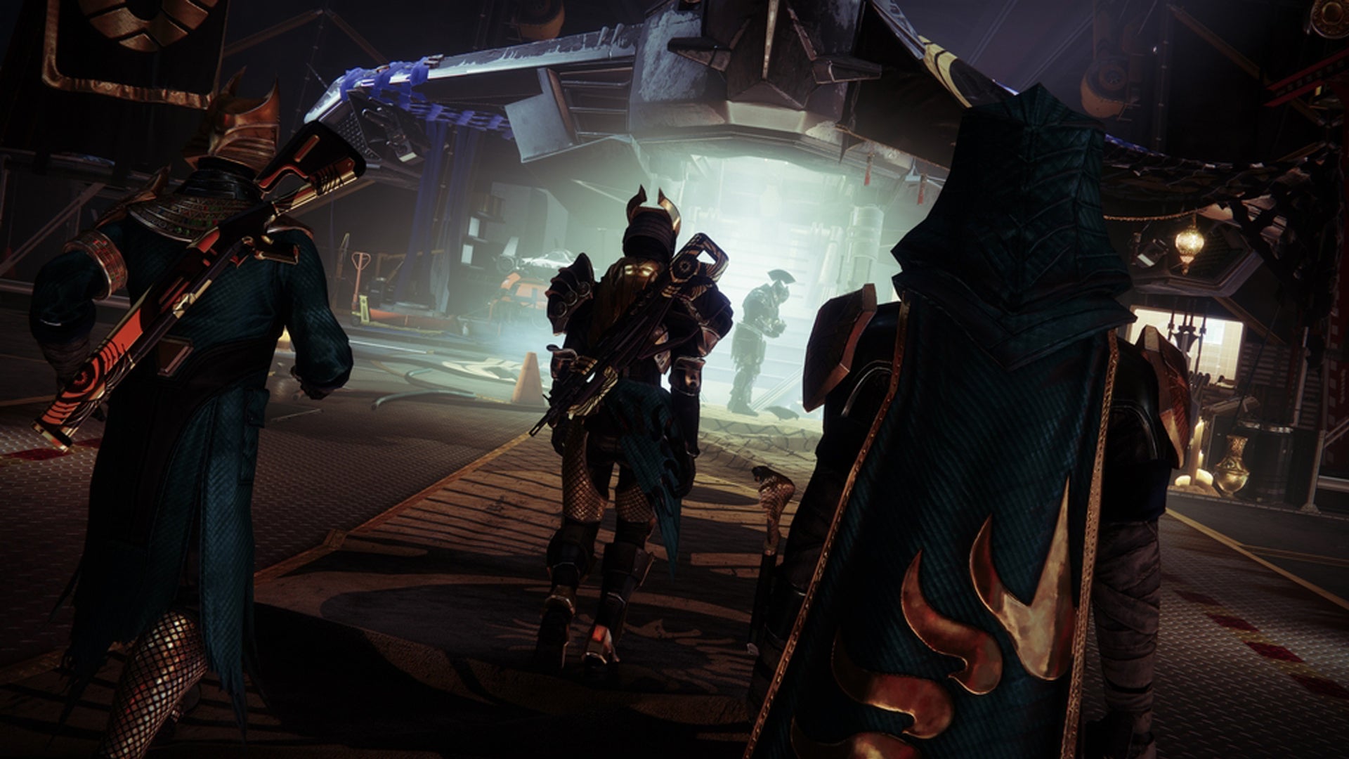 A group of Destiny 2 player characters stood in a sci-fi room that looks like a forge. - 4