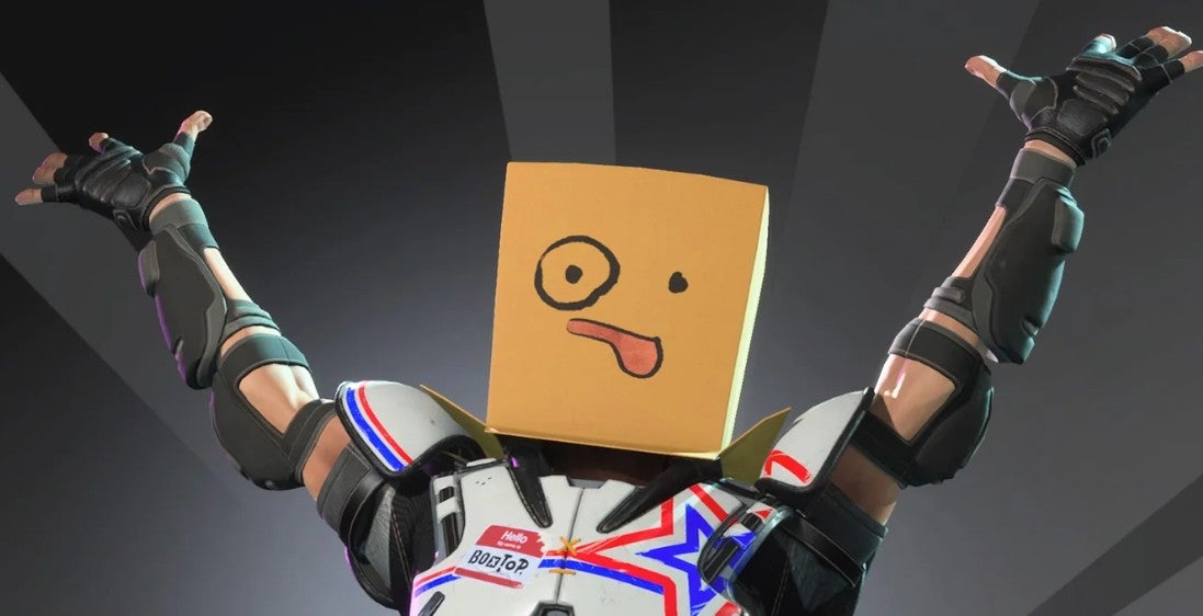 A character with a cardboard box on their head, and a silly face drawn onto it, raises their hands as if in victory. It's a screenshot from Destruction AllStars.