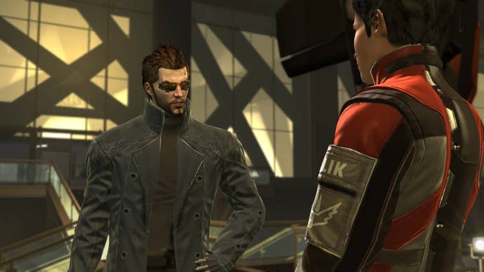 Chatting in a Deus Ex: Human Revolution Director’s Cut screenshot.