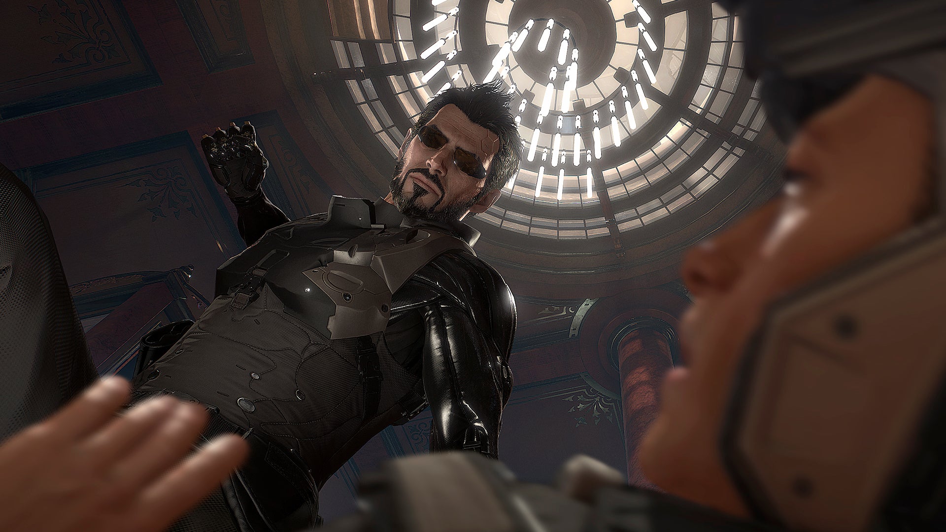 Adam Jensen prepares to punch someone in Deus Ex: Mankind Divided - 1