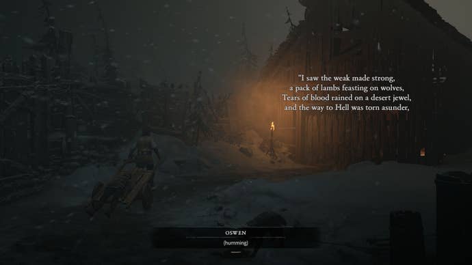 A scene from the Diablo 4 beta showing someone approaching a shack in a show storm at night, pulling someone else on a handcart