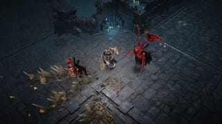 A necromancer using their abilities to fight Blue Skull enemies in Diablo Immortal