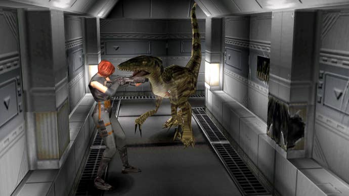 Regina, the heroin of Dino Crisis, points a gun at a dinosaur in a metal hallway.
