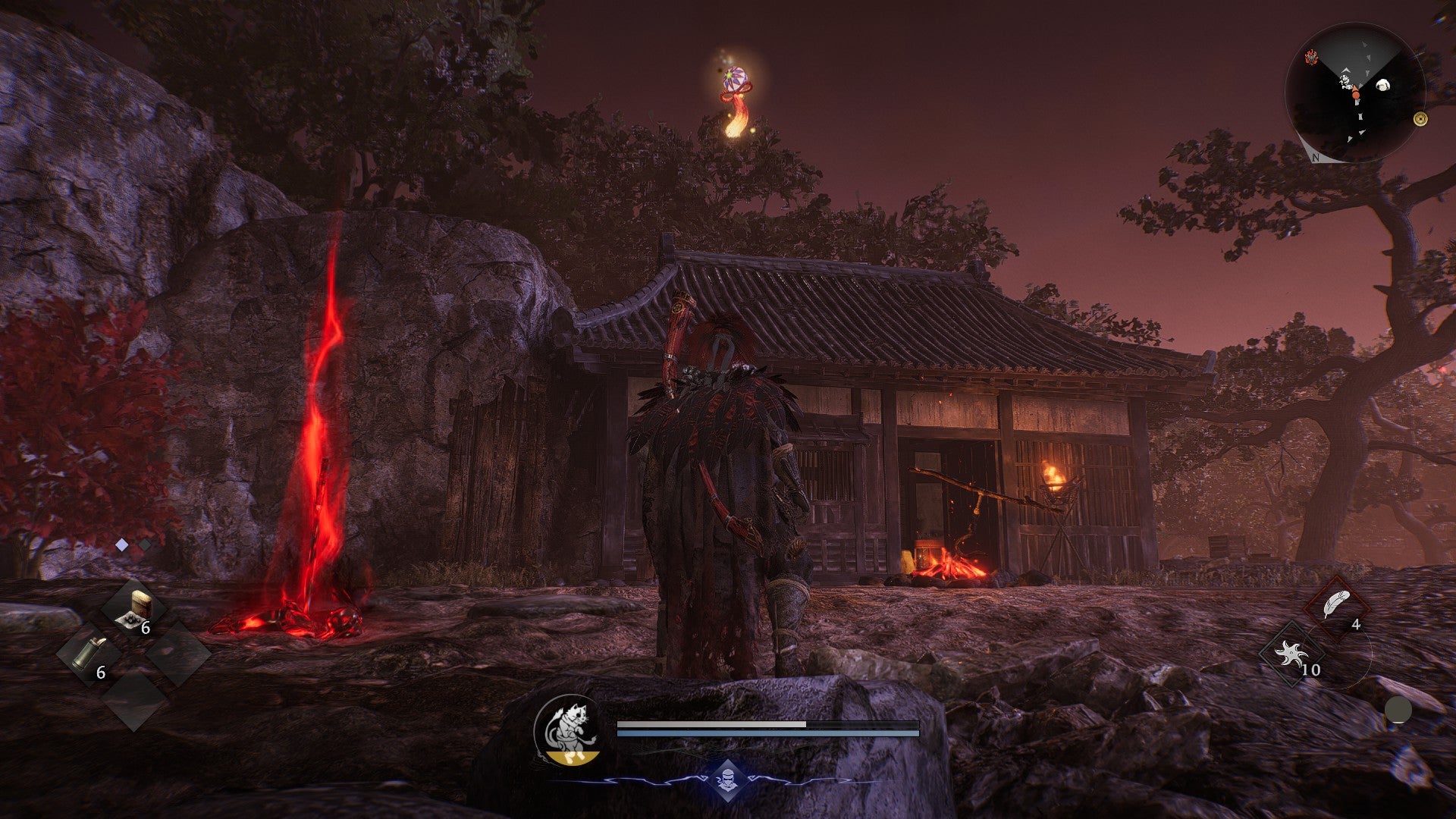 Standing outside the house that can be unlocked by the Dirty Key in Nioh 3. - 4