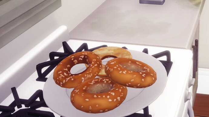 disney dreamlight valley a rift in time sesame seed bagels on white plate on a stove.