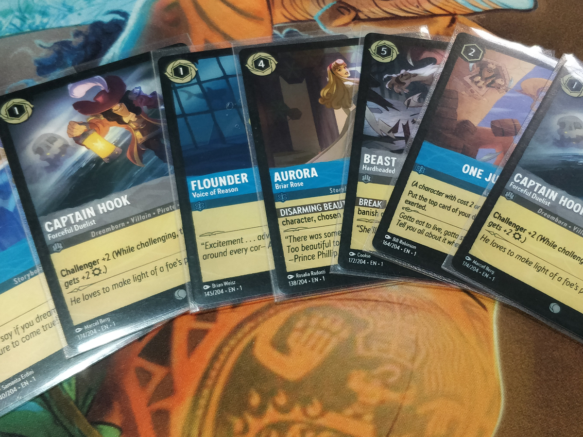 lorcana demo cards Developers Reveal New Cards, Foiling Treatment Details, And More At GAMA Expo Disney Lorcana Demo Game New