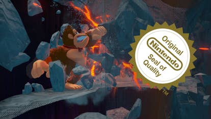 DK Bananza screenshot cropped to show DK smashing some rubble with the camera clipping through faded near-ground scenery, overlaid with an Official Nintendo Seal of Quality