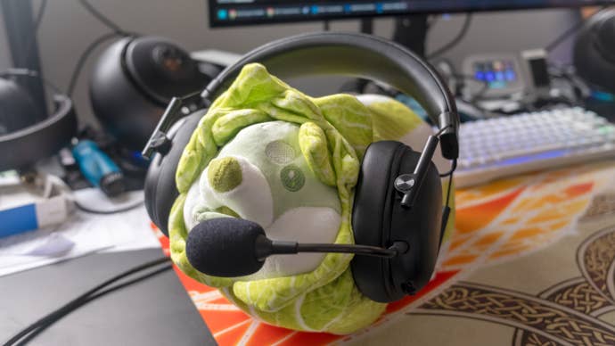 a chinese leaf dog wearing a razer blackshark v3 x hyperspeed gaming headset