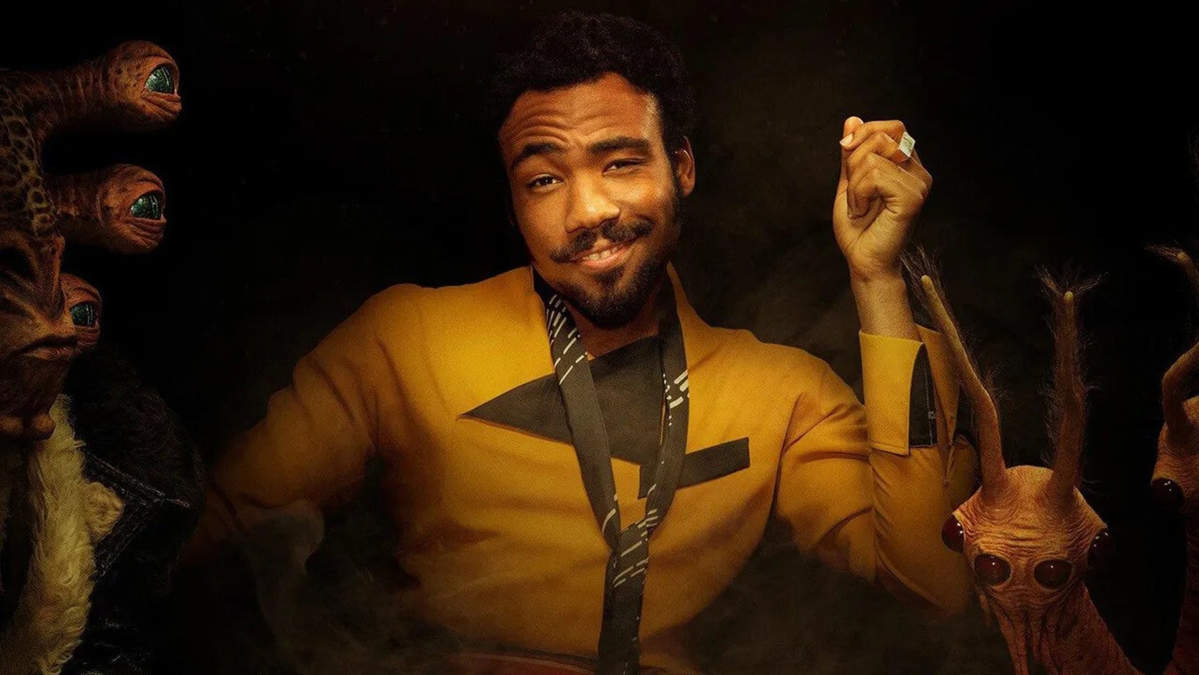 Donald Glover as Lando Calrissian, he's sat with a smug smile on his face, aliens around him. - 1