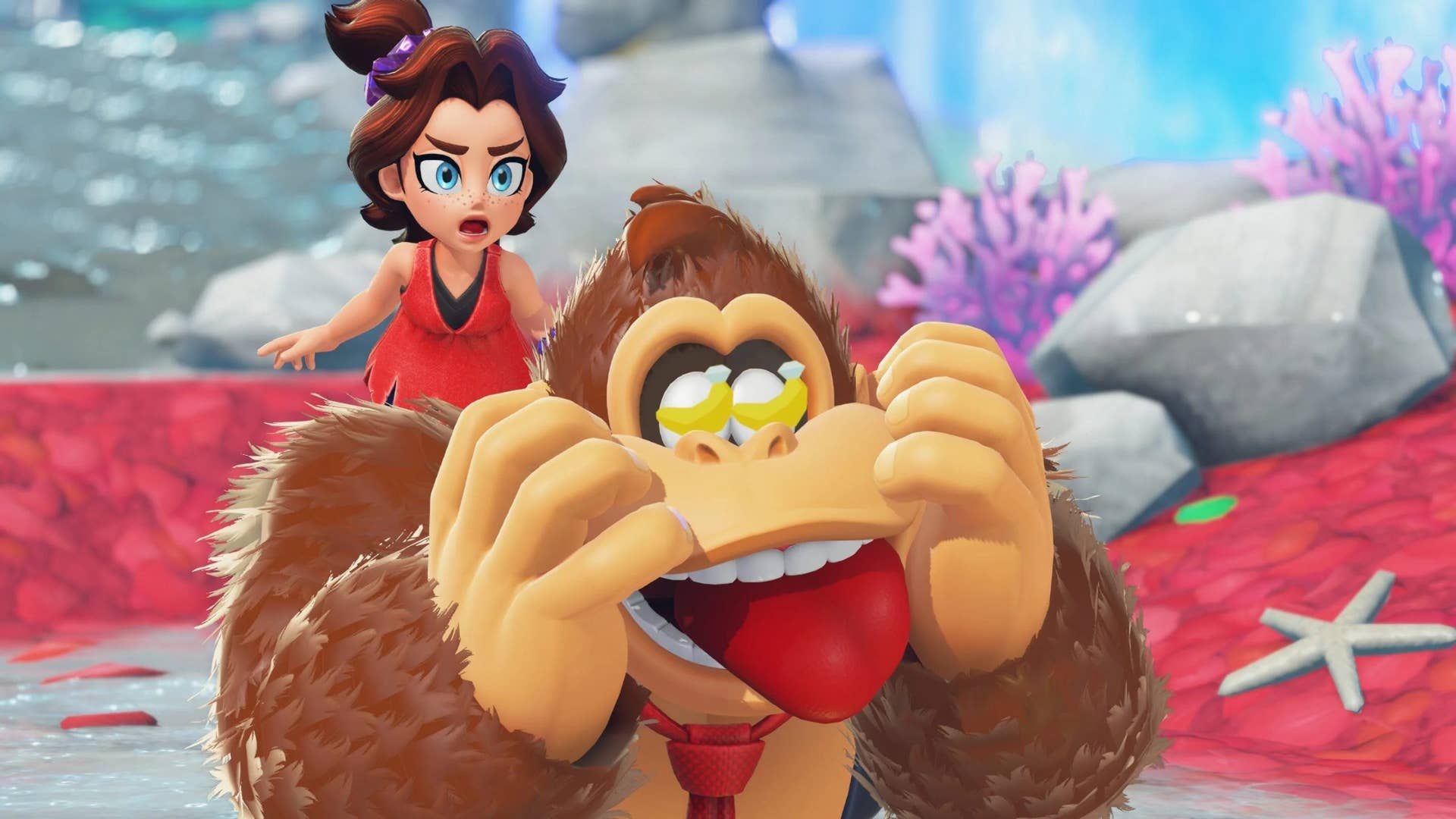 DK and Pauline in a screenshot from a Donkey Kong Bananza cutscene. DK is transfixed by bananas; Pauline is more serious and thoughtful.