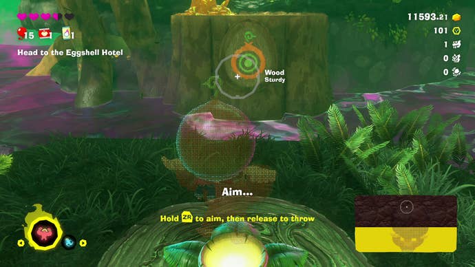 Donkey Kong gets ready to throw an item in this DK Bananza screenshot.