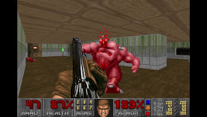 The player shotguns a pinkie in Doom (1993)