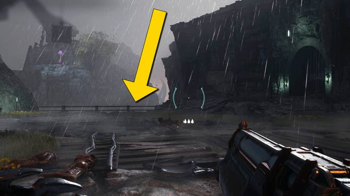 The player in Doom: The Dark Ages runs towards a fenced off cliff edge beside a locked gate in Chapter 1.