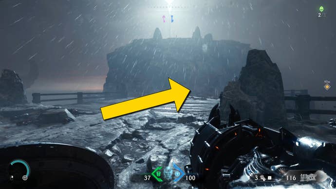 The player in Doom: The Dark Ages runs towards a white-lit cliff ledge, with a yellow arrow pointing towards the right-hand path.
