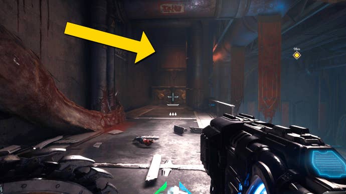 The player in Doom: The Dark Ages heads towards a rectangular opening in the wall of a building above a couple of crates, near the start of Chapter 2.