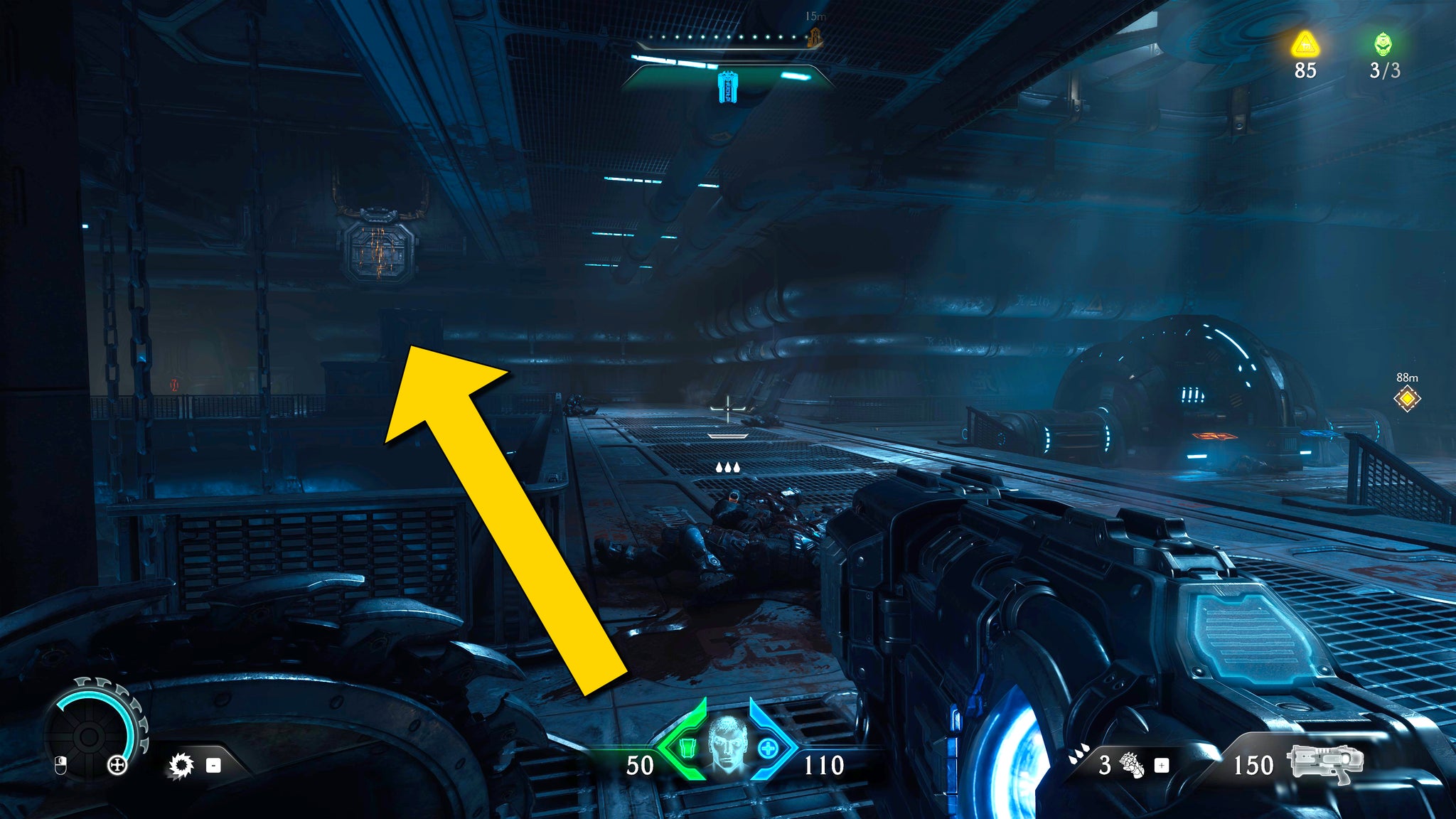 The player in Doom: The Dark Ages walks along a raised metal walkway near the end of Chapter 2. A yellow arrow points towards a hidden vent shaft entrance above a stack of crates. - 41