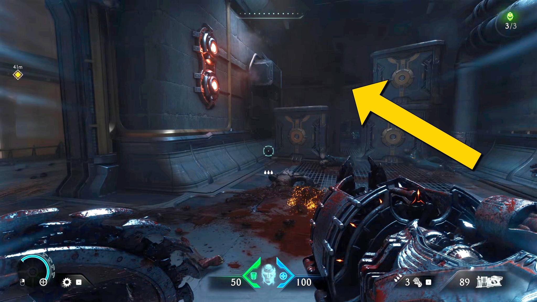 The player in Doom: The Dark Ages looks at a stack of crates in a corridor in Chapter 2. A yellow arrow signals for the player to jump over the crates. - 15