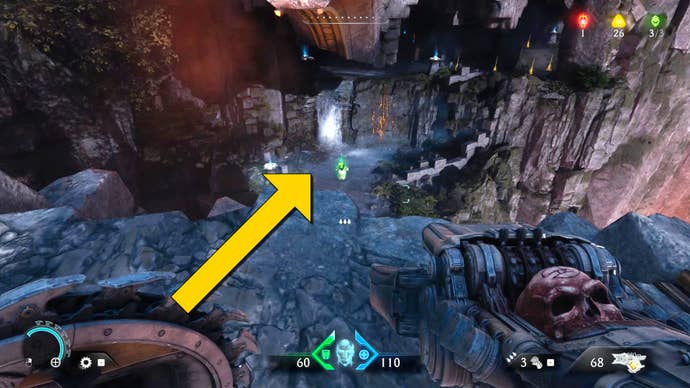 The player in Doom: The Dark Ages looks down from a broken bridge platform to a hidden area below them, where an armour pickup and climbable wall leading to a secret area can be seen.