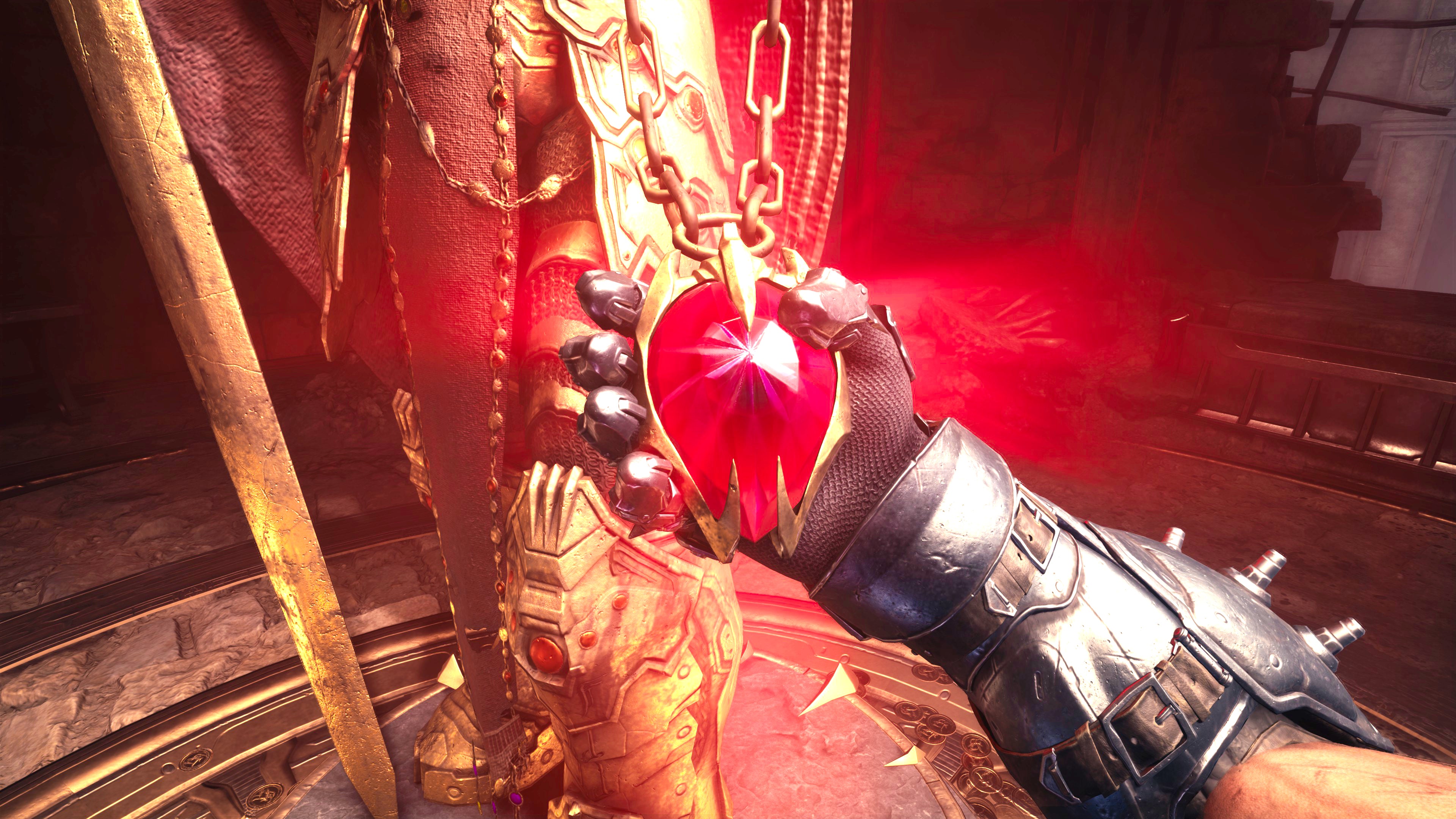 The player in Doom: The Dark Ages takes a glowing red Ruby pickup from a gold statue in Chapter 5. - 16