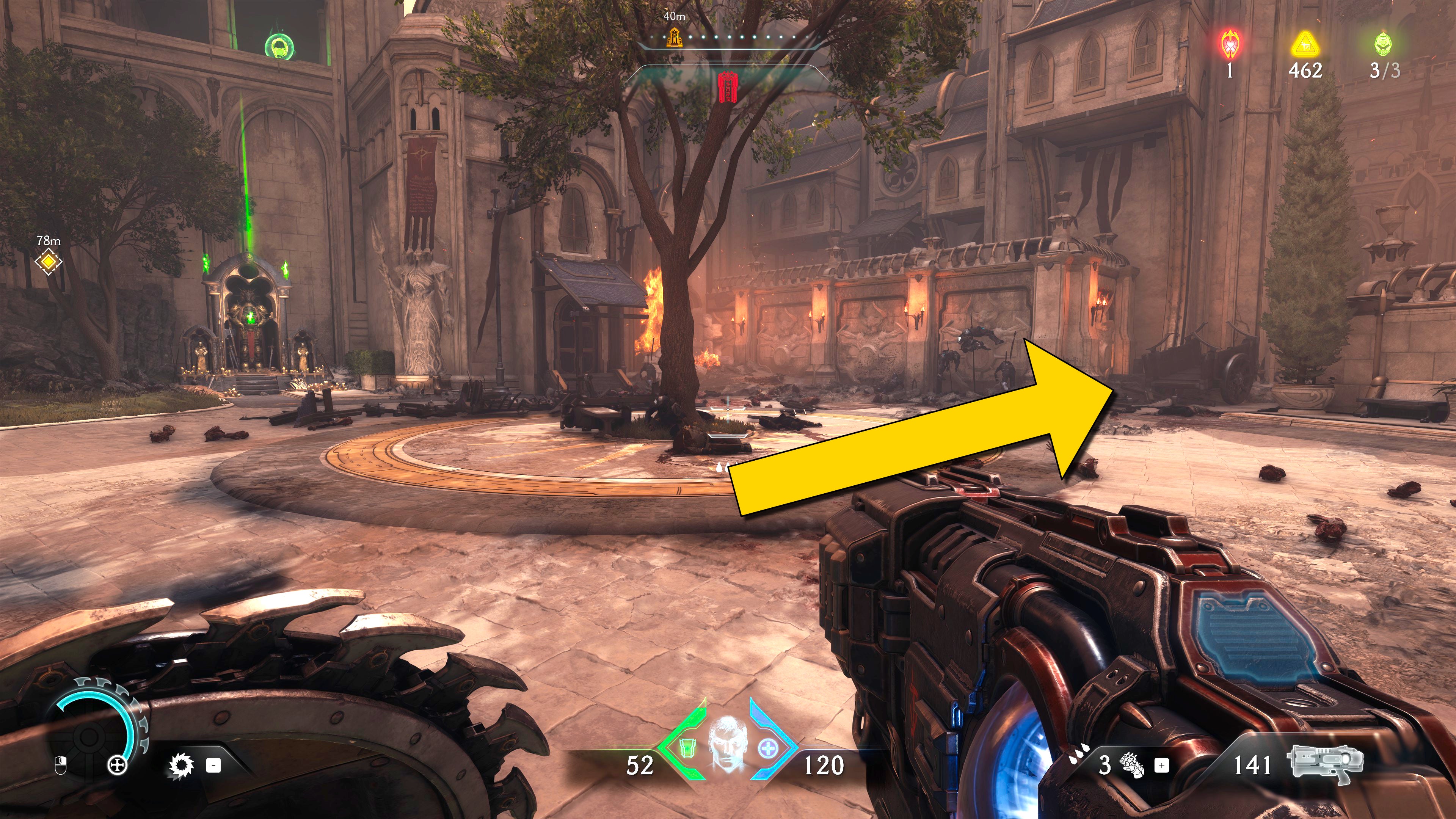 The player in Doom: The Dark Ages walks through a plaza in a section of Chapter 5's city, with a tree in the centre of the area and a Sentinel Shrine in the background. A yellow arrow points towards a pathway to the right. - 18