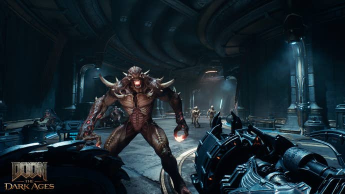 A demonic humanoid enemy stands grimacing at the Doom Slayer in Doom The Dark Ages. I don’t know what they’re so happy about.