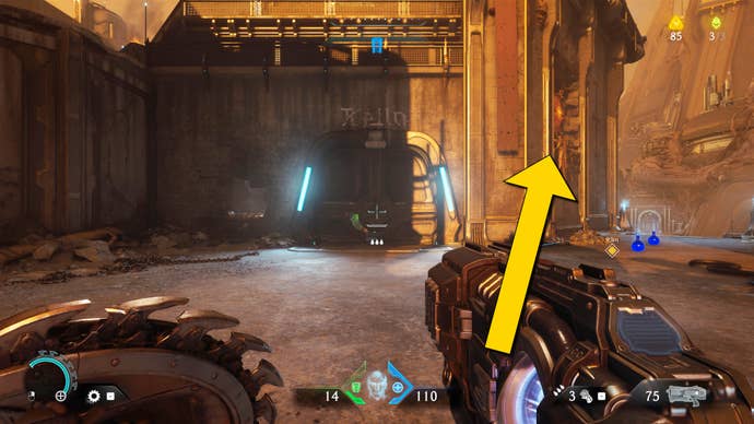 The player in Doom: The Dark Ages stands in front of a door near the Flaming Door puzzle outside towards the end of Chapter 2.