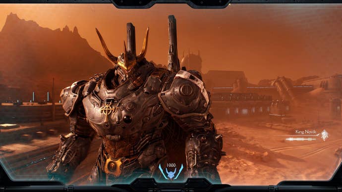 The mech of an ally stands in front of the player’s view, with bulky armour and an ornate helmet.