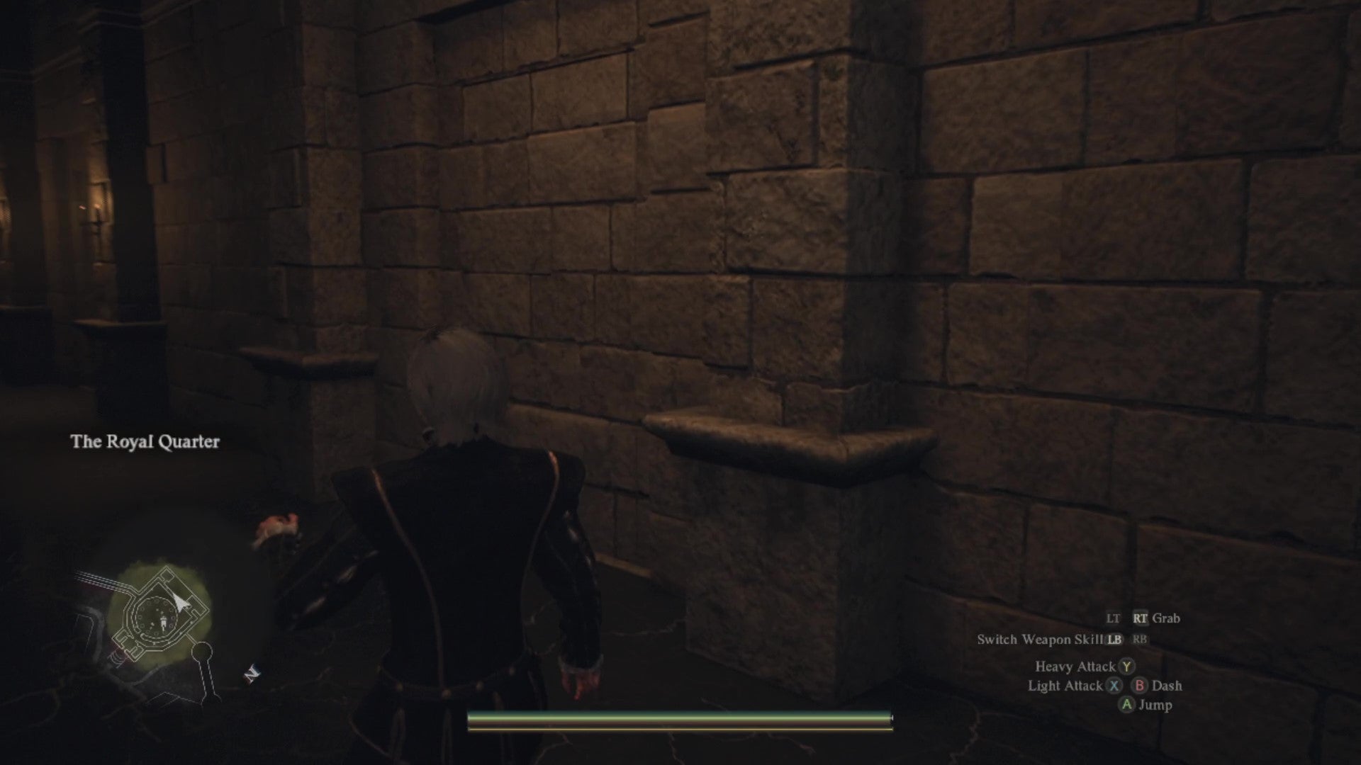 A castle wall with the outline of a &ldquo;hidden&rdquo; doorway visible in the stonework.