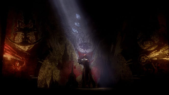 A shadowy figure stands next to a wall with a large wolf mural on it in Dragon Age: Dreadwolf