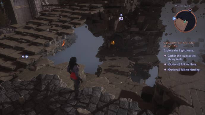 Rook standing over the path down to the second set of Lighthouse statues in Dragon Age: Veilguard.