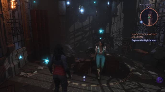 Neve leaning against a desk in her office in the Lighthouse in Dragon Age: Veilguard.