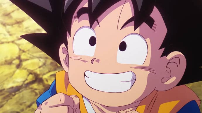 Goku, shrunk down to a short stature, has a big smile on his face in Dragon Ball Daima.