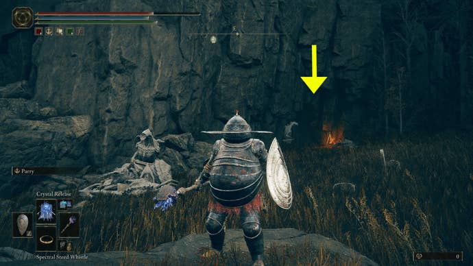 A screenshot with a yellow arrow indicating the entrance to the Dragon’s Pit dungeon in Elden Ring: Shadow of the Erdtree.