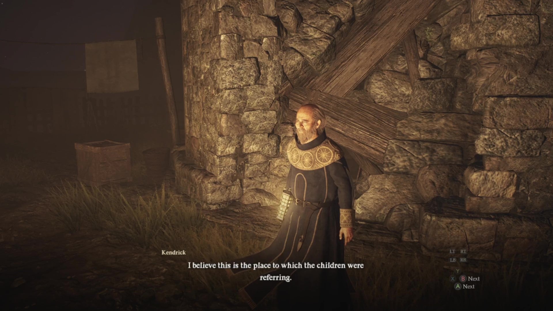 Kendrick stands in front of a boarded up archway in a stone wall. - 10