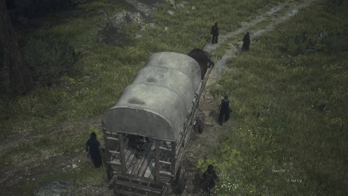 An Oxcart makes its way along a cart track in the wilderness outside Vernworth.