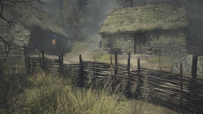 dragons dogma 2 nameless village buildings with wooden wicker fences.