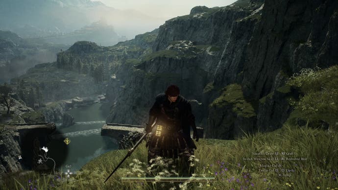 Dragons Dogma 2 preview screenshot showing the main character look towards the camera in a grassy, rocky mountainous area