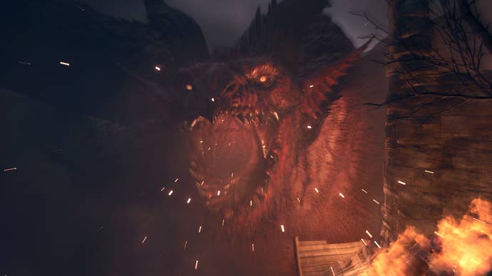 dragons dogma 2 image of a dragon roaring amongst flames