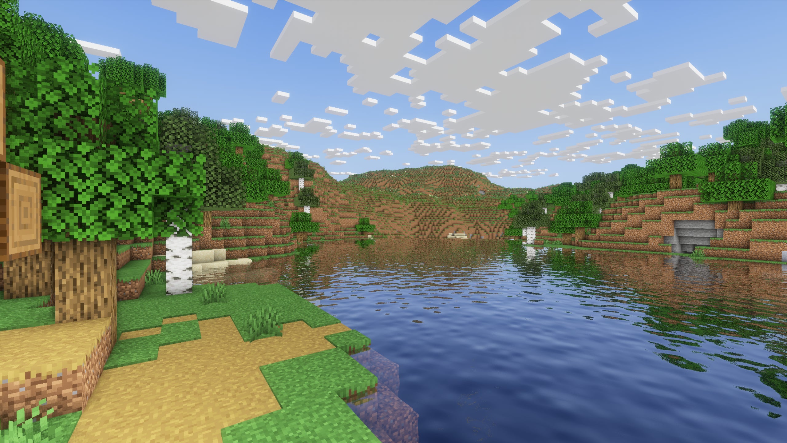 A screenshot of a river in Minecraft, with some trees on either side of the bank and a hill in the distance, taken using DrDesten