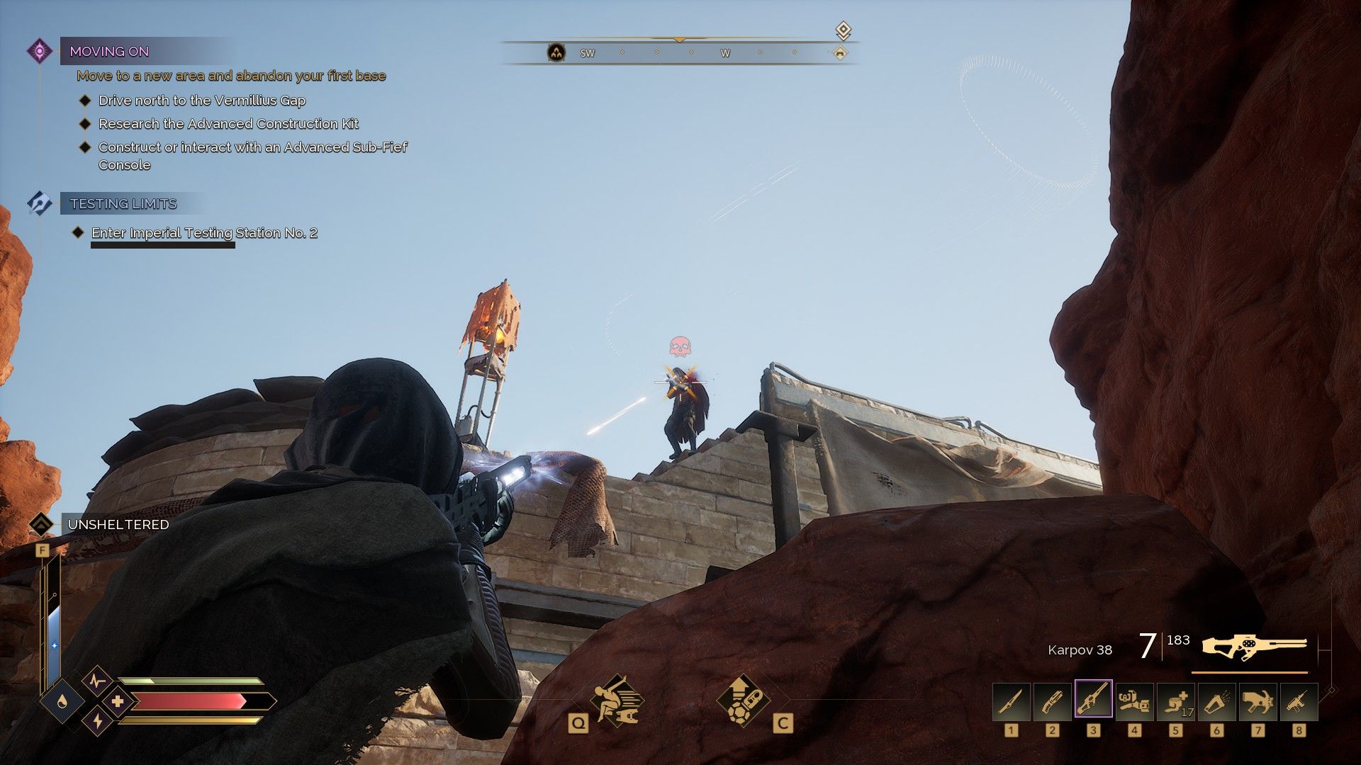 The player fires a gun at an enemy standing on a ledge high above. - 5