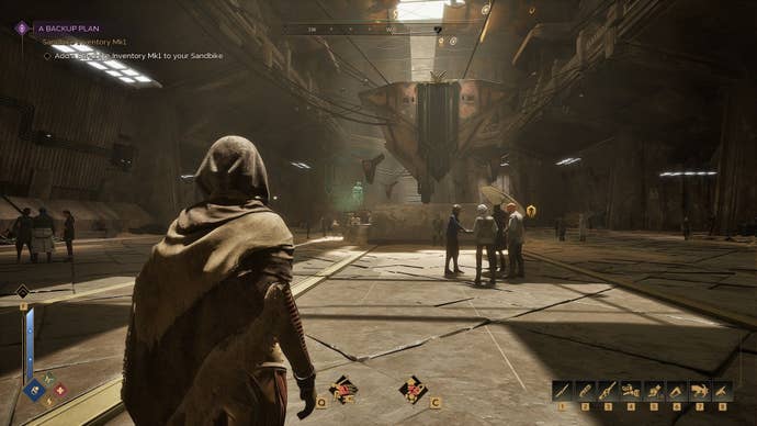 The subordinate stands inactive portion looking down a corridor successful a populated settlement.