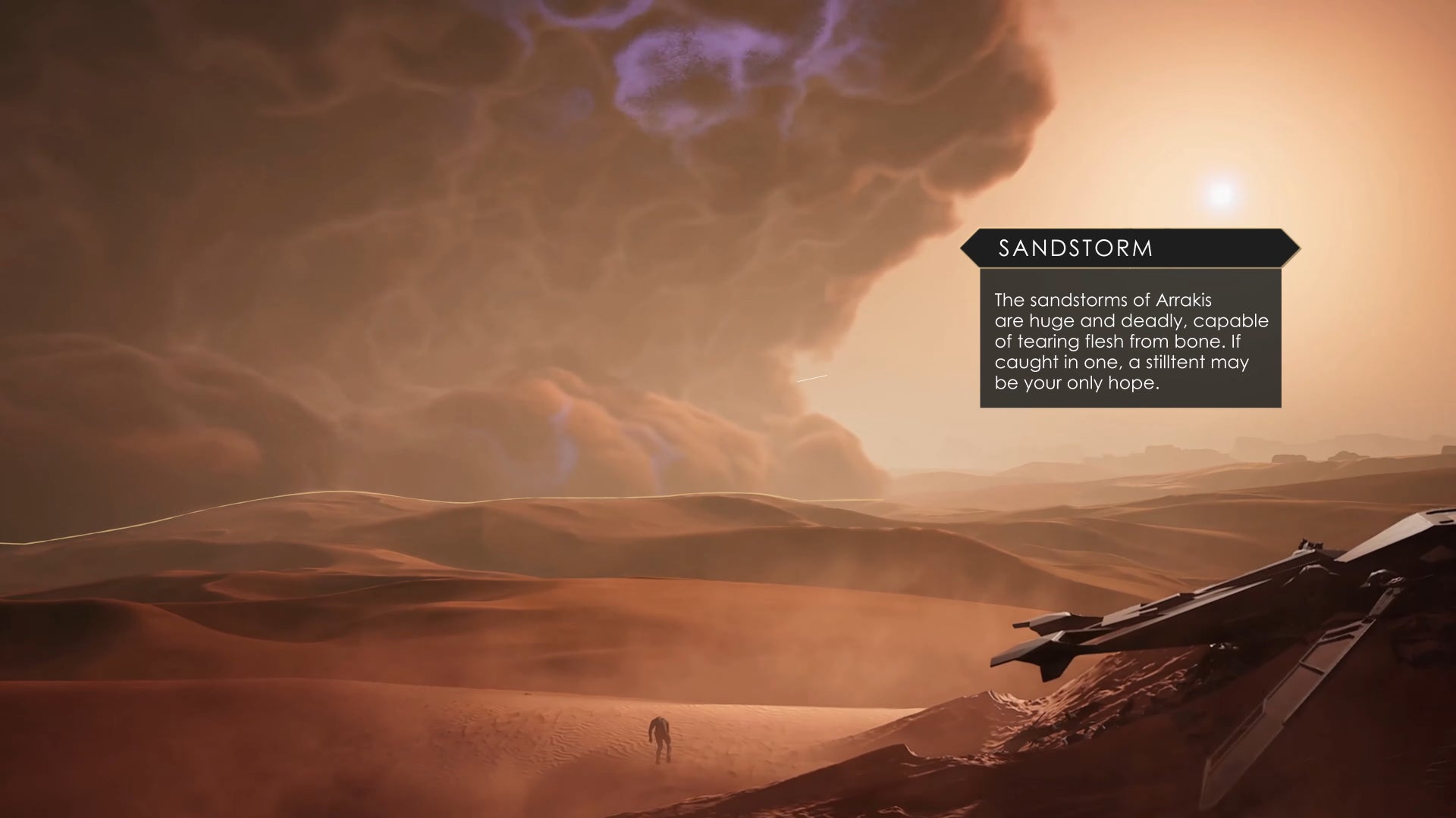 A desert landscape where a human stands and looks out towards a gigantic sandstorm in Dune: Awakening.