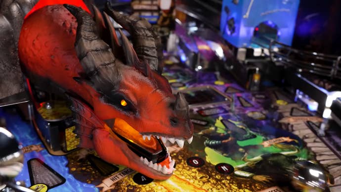 A dragon’s head on a Dungeons & Dragons themed pinball machine.