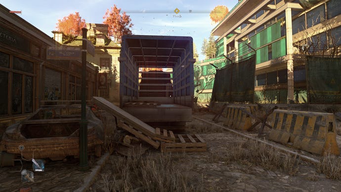 A Dying Light 2 screenshot, showing an abandoned street with no ray tracing effects.