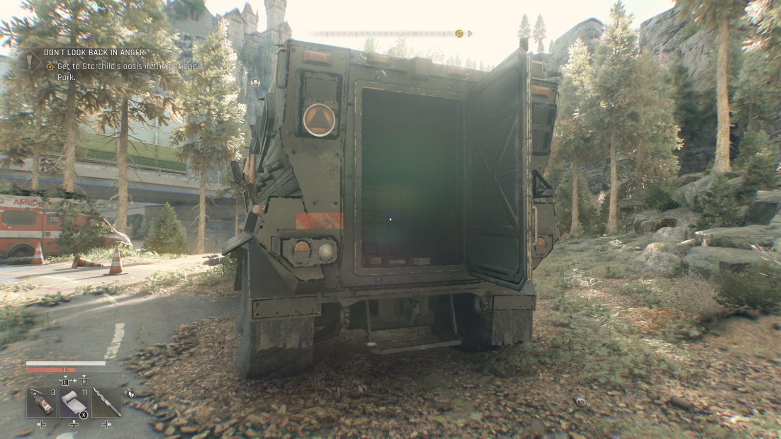 Dying Light: The Beast screenshot showing an open convoy truck braced by Pine trees and a highway bridge in the distance.