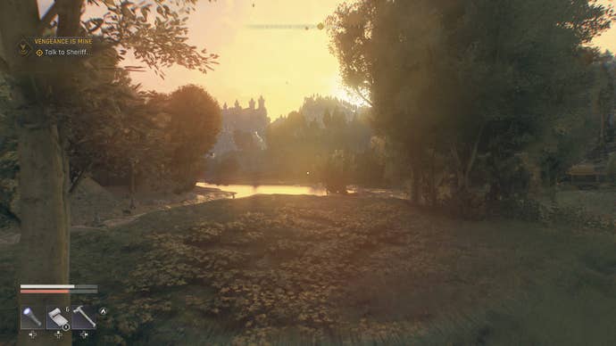 Dying Light: The Beast screenshot showing a golden sunset over a tree-flanked lake with a castle in the distance.