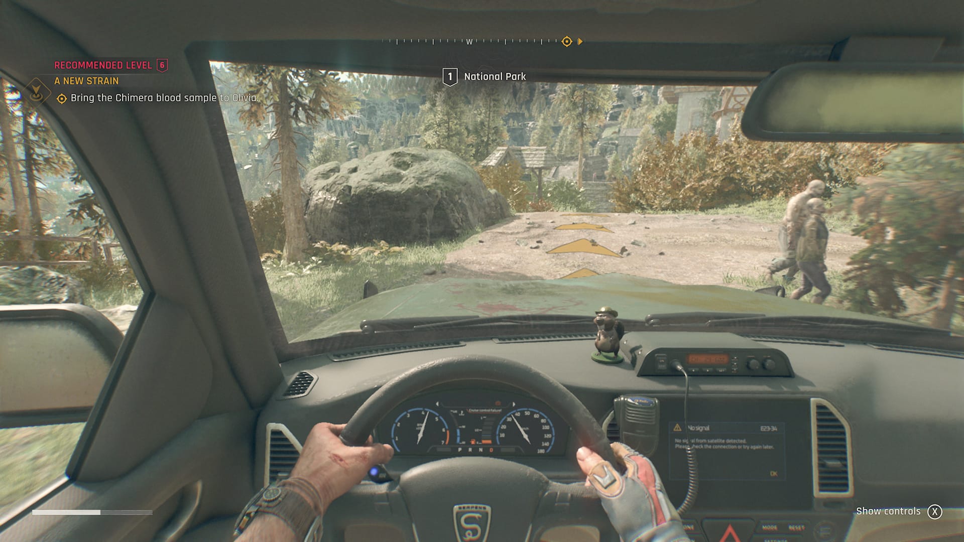 Dying Light: The Beast screenshot showing Kyle Crane at the wheel of a truck, swerving to avoid Biters as he drives towards a building.