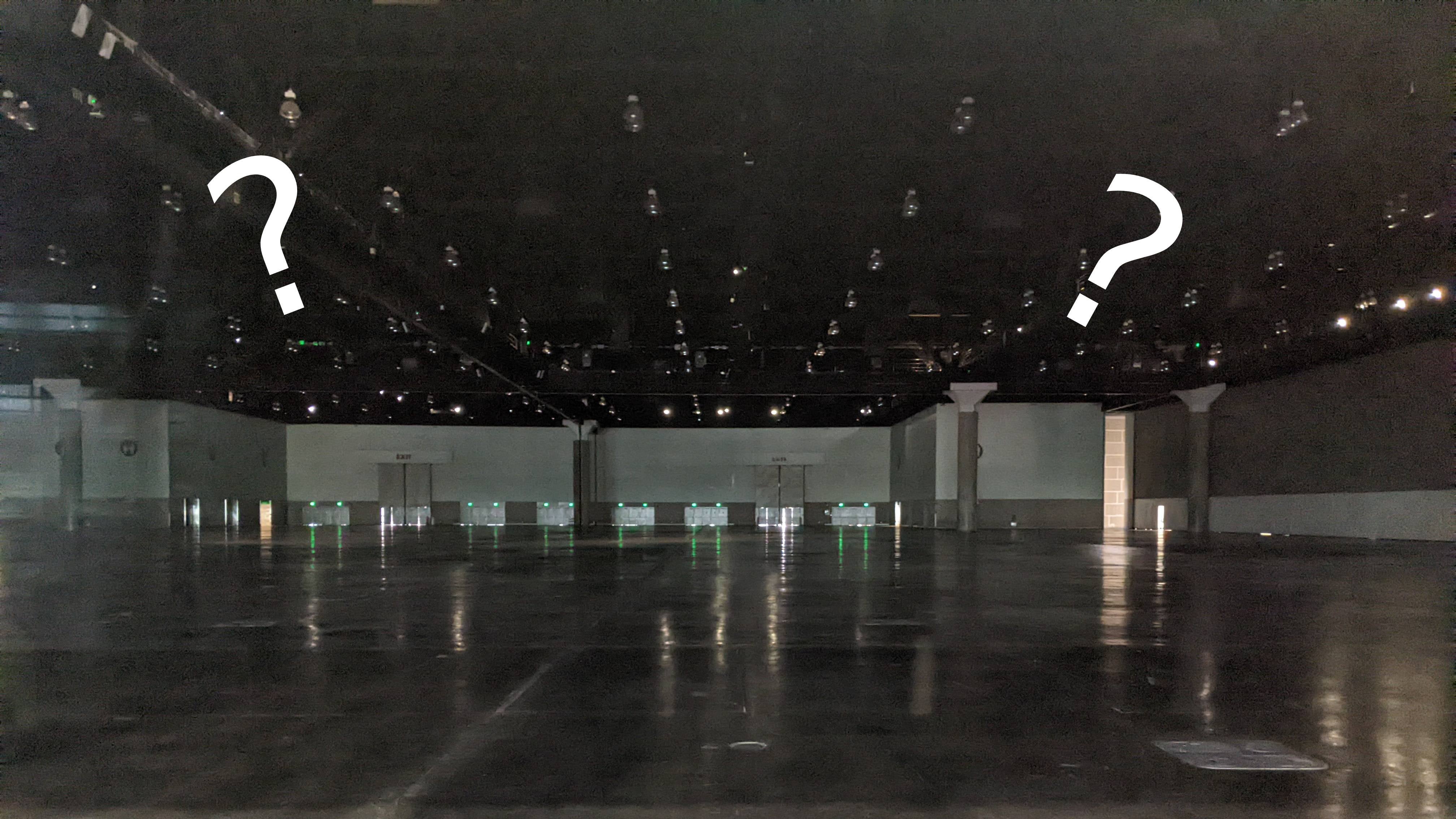 Emtpy E3 hall with question marks on it